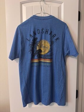 Margaritaville Blue Tee with Yellow Moon Wave Graphic